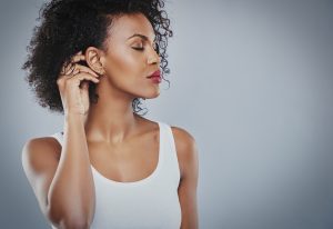 Woman showing her contoured jawline