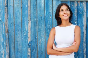 Woman crossing her arms and smiling