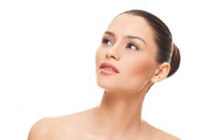 Woman showing her long neck and contoured jawline